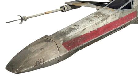 Close up shot of the front of an X-Wing fighter